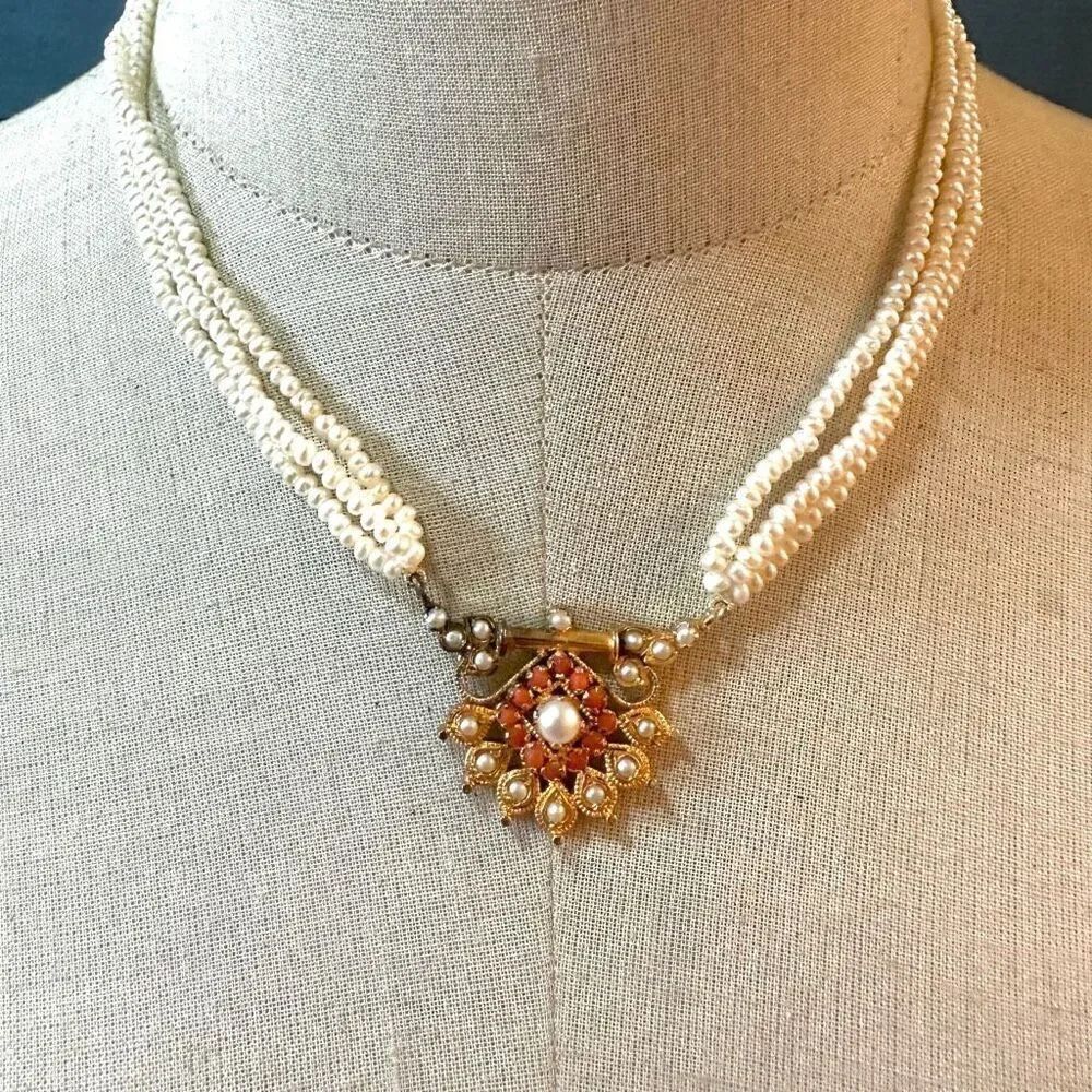 Pearl multi strand pendant necklace